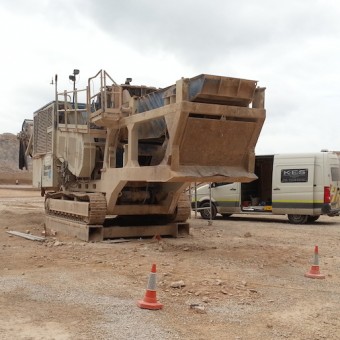 Offloading a newly remanufactured radiator for a screener in the quarry